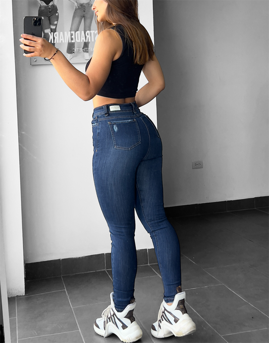 Skinny jean tiro alto