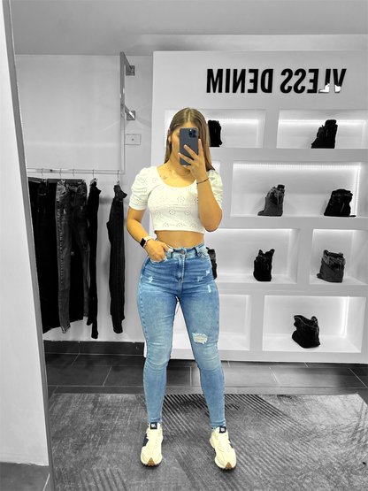 Skinny jean tiro alto